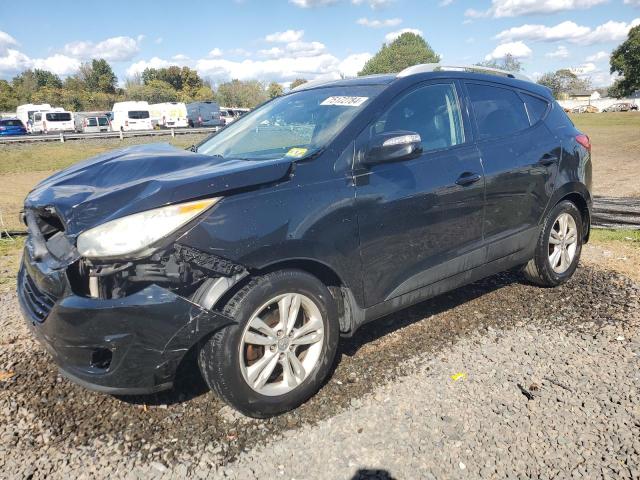 2012 HYUNDAI TUCSON GLS VIN: KM8JUCACXCU542007