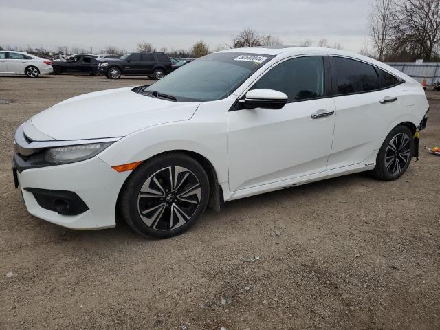 2016 HONDA CIVIC TOUR VIN: 2HGFC1F97GH113528