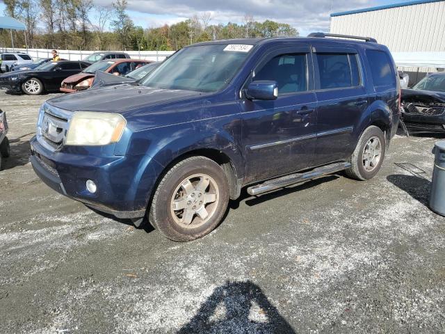 2011 HONDA PILOT TOUR VIN: 5FNYF3H92BB014122